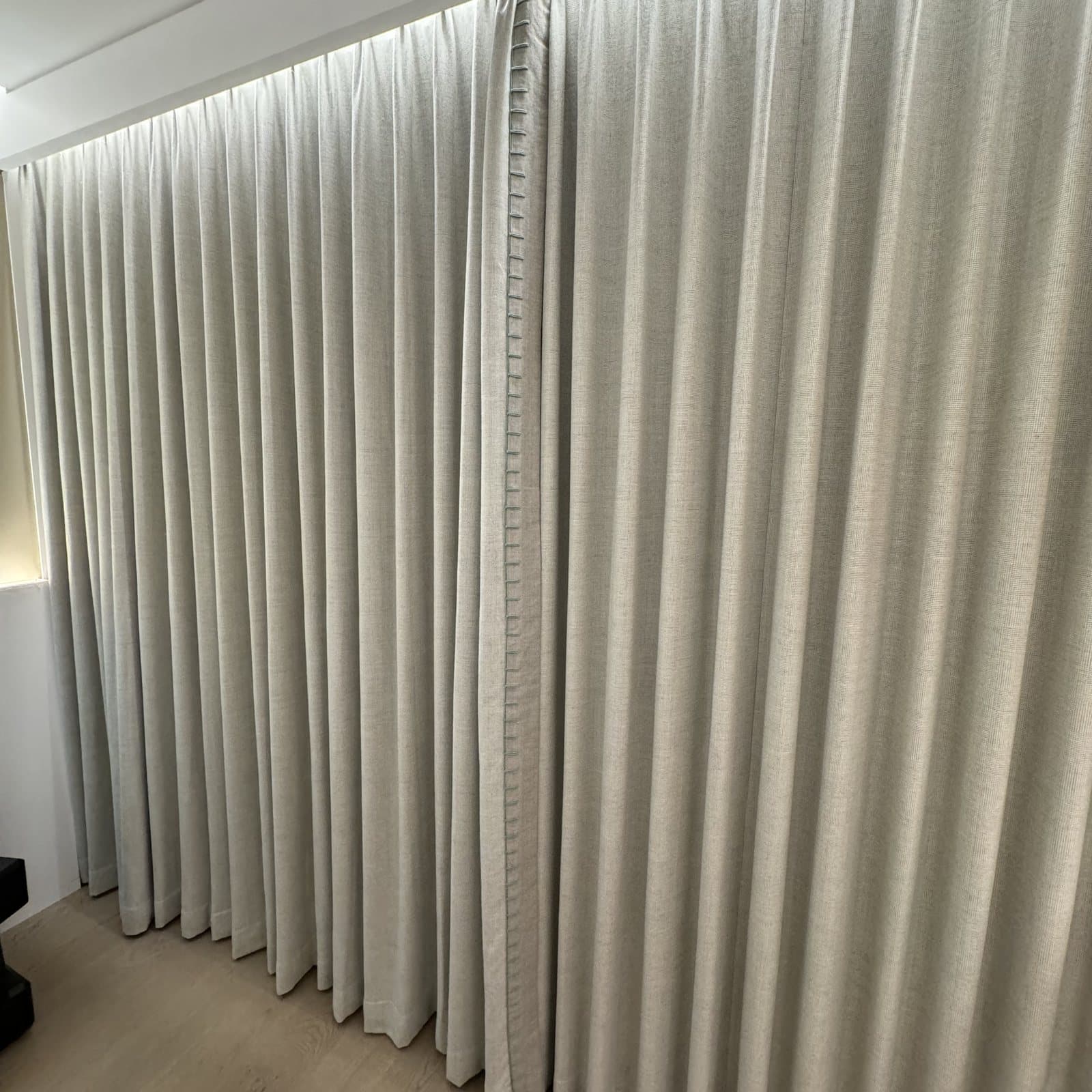 Layered drapery installed in a South Florida bedroom
