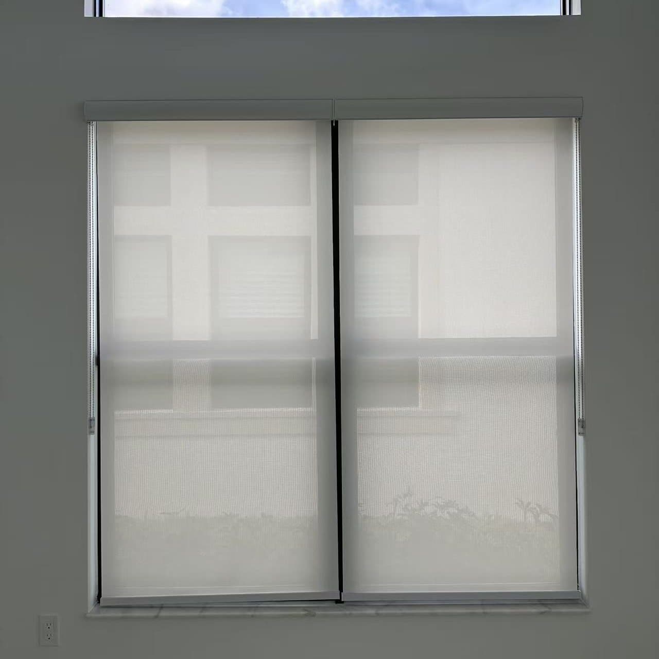 Custom roller shades installed in a South Florida home