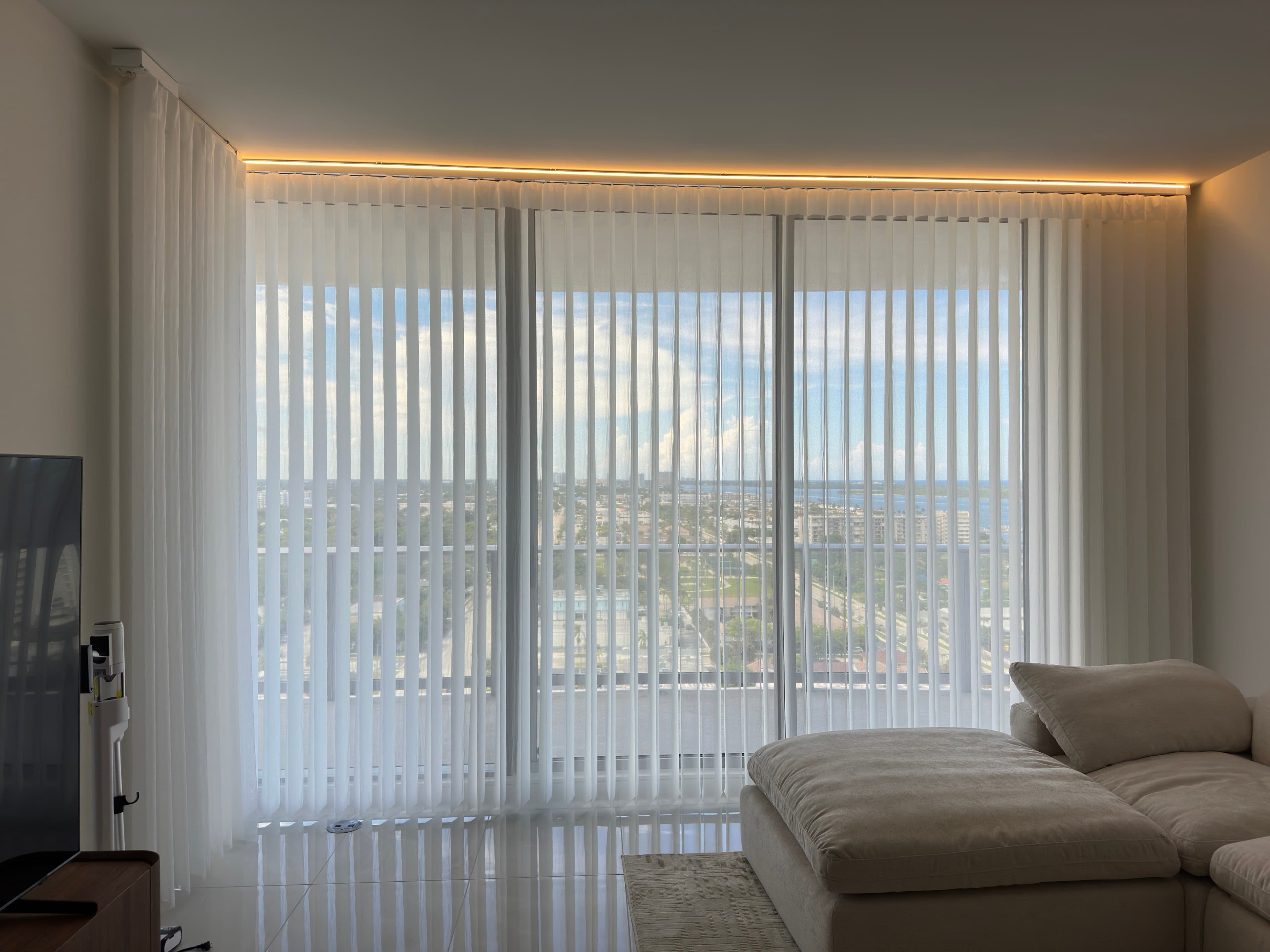Closed Dream Sheer panels filtering daylight across floor-to-ceiling windows